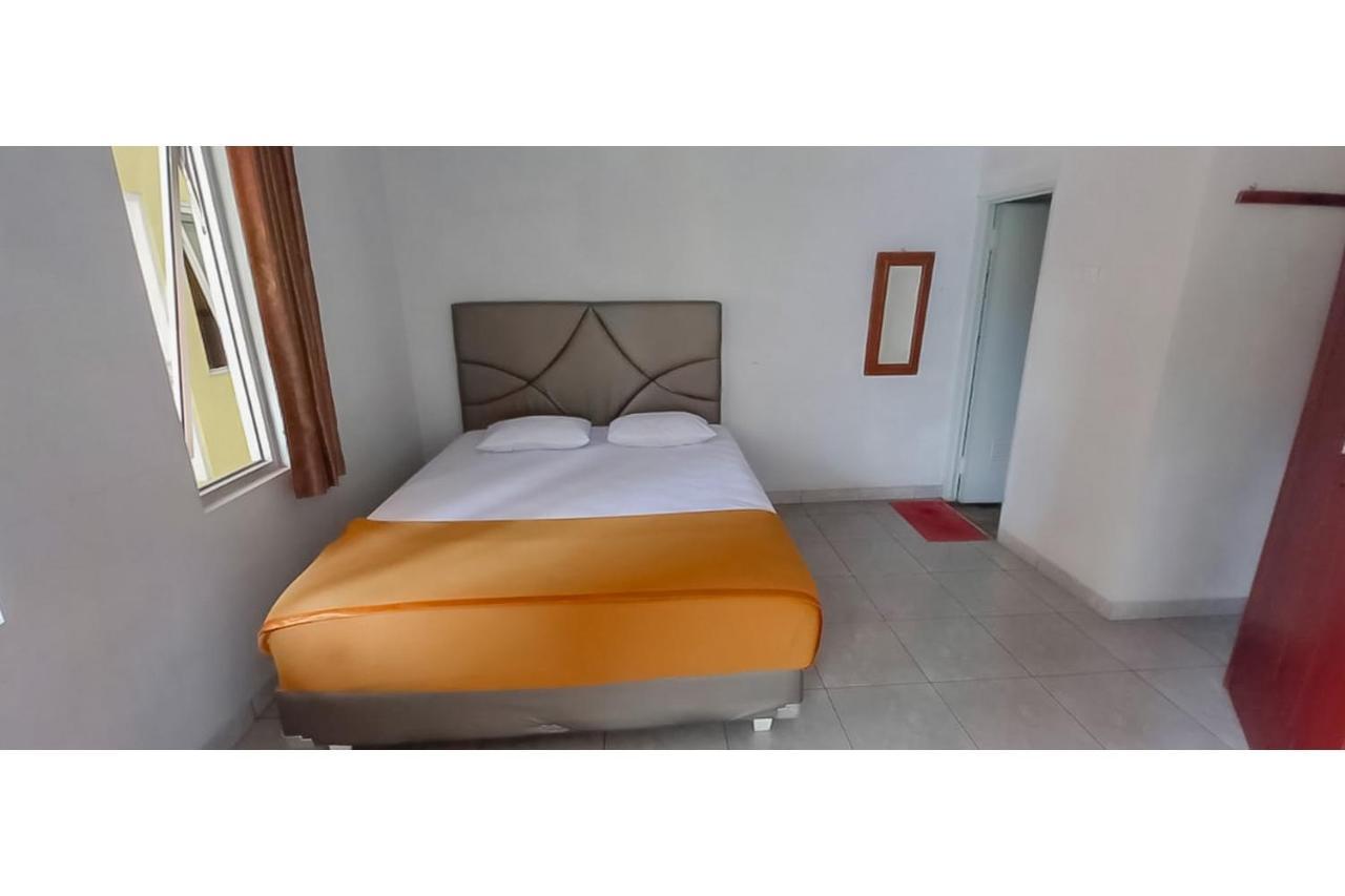 Hotel Sri Indrawati Puncak Mitra Reddoorz Богор Экстерьер фото